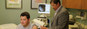 Male patient receiving Stem Cell Regeneration Therapy from Dr. Garramone at Colorado Family Orthopaedics